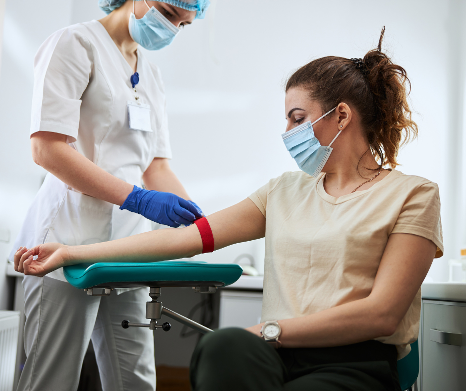 woman receiving blood testing