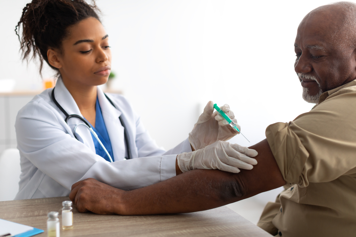 Older gentleman receiving vaccine