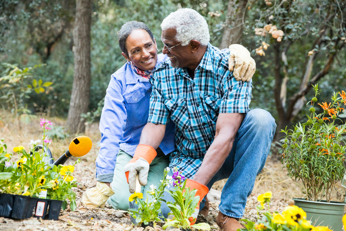 Mature couple gardening and staying active