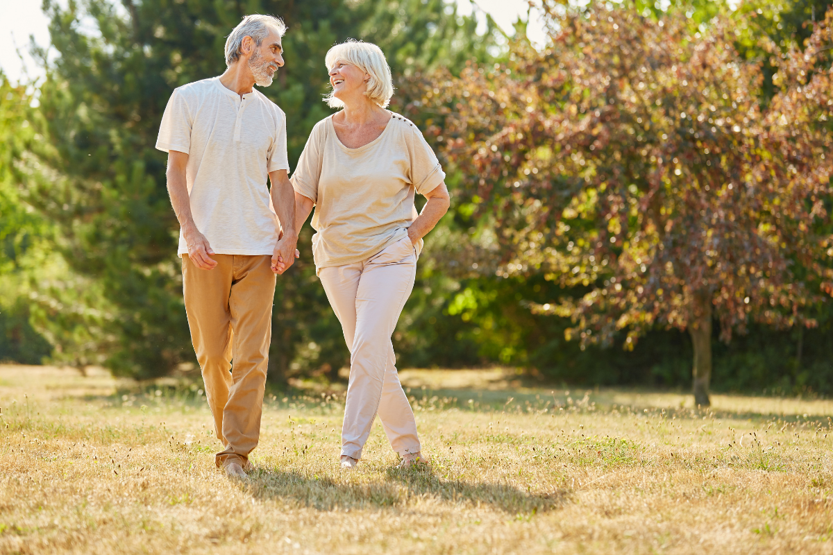 Healthy senior couple walking outside
