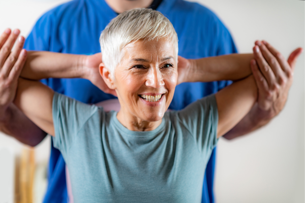 A woman receiving pain-relieving chiropractic care for her joints