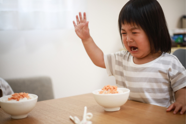 Toddler upset because they don't feel like eating, one of the common Rotavirus symptoms