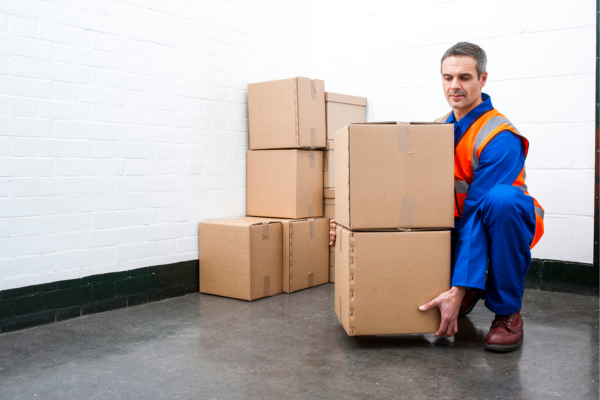 Man exhibiting proper lifting technique